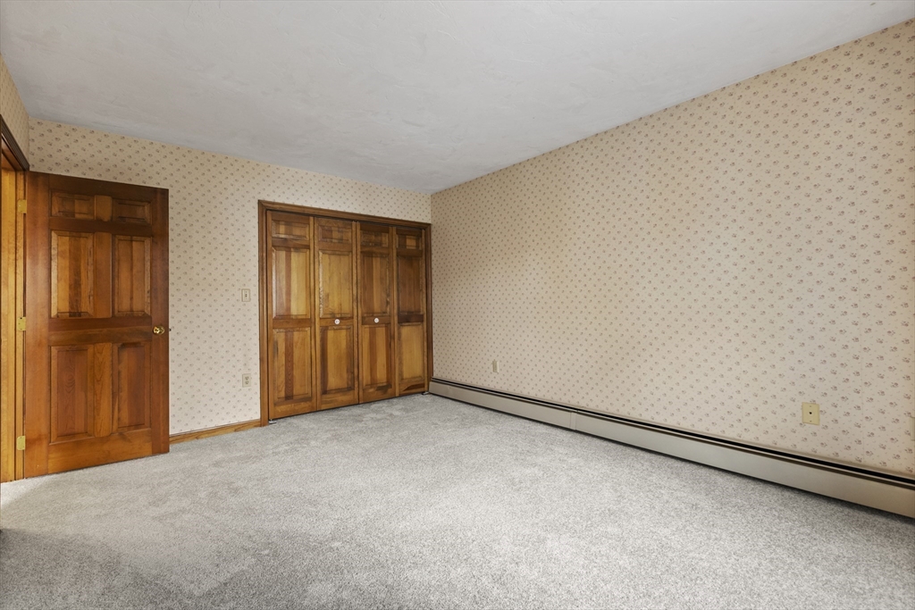 43 Maple Road Westford, MA 01886 - Photo 24 of 31 an empty room with windows