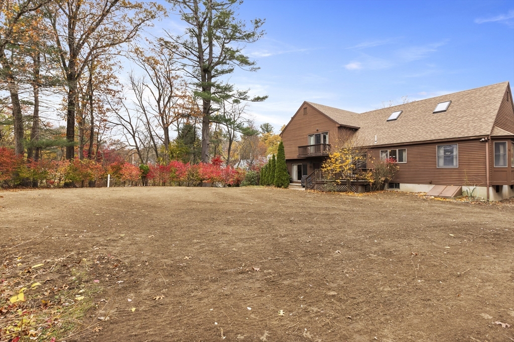 43 Maple Road Westford, MA 01886 - Photo 27 of 31 a view of road with large trees