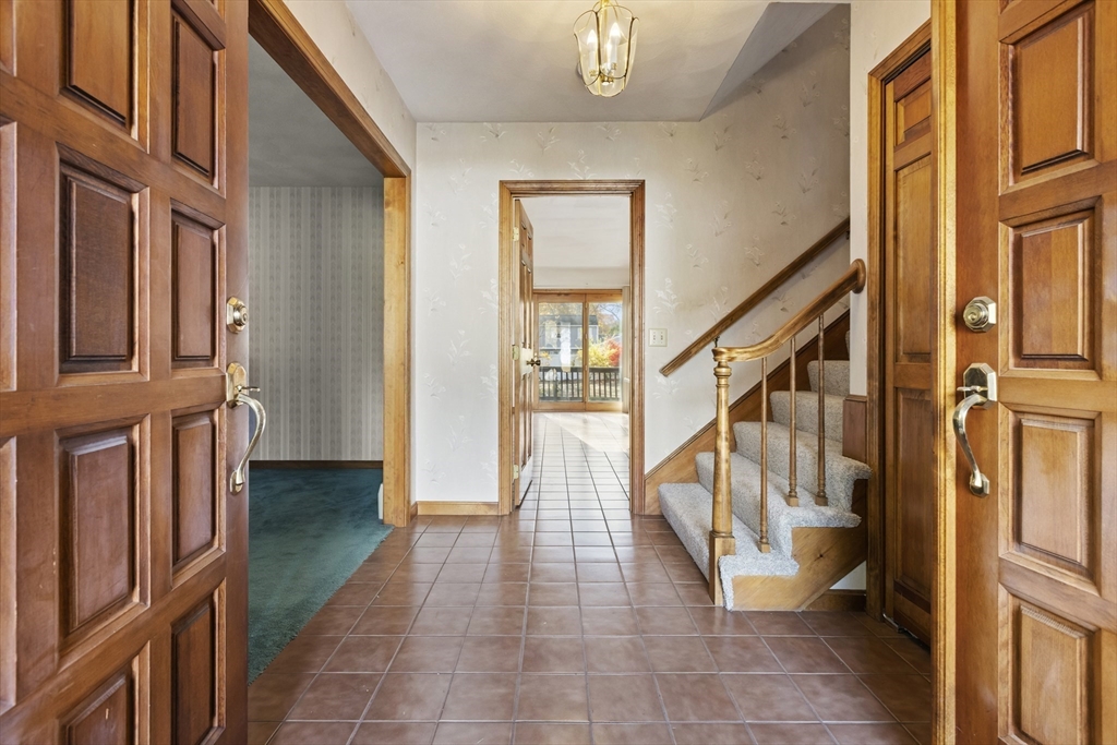 43 Maple Road Westford, MA 01886 - Photo 4 of 31 a view of an entryway with staircase