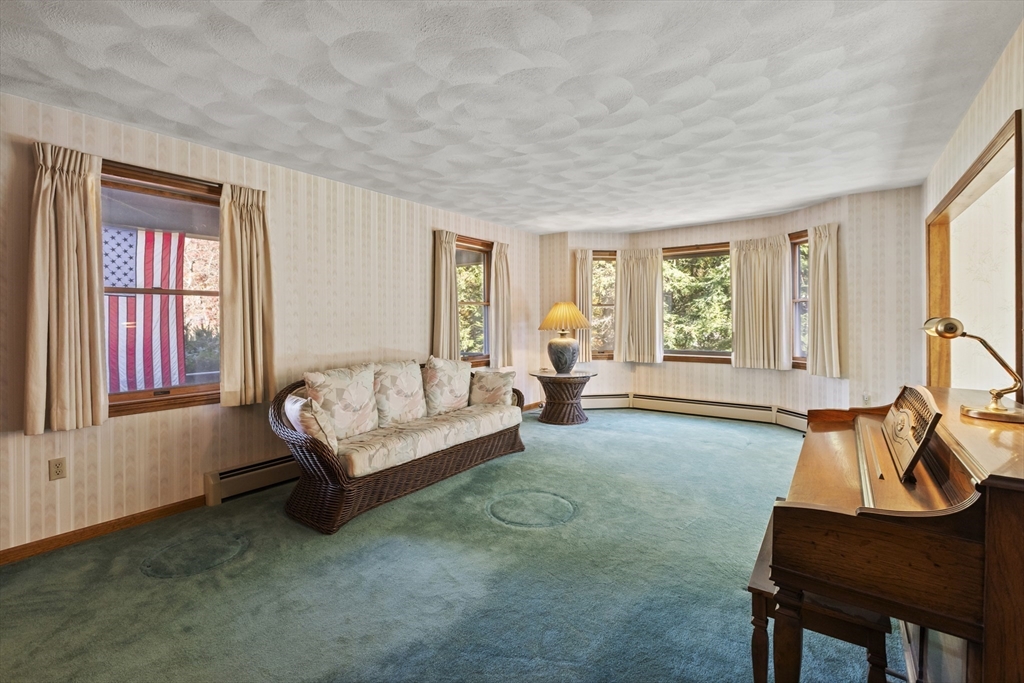 43 Maple Road Westford, MA 01886 - Photo 5 of 31 a living room with furniture and a window