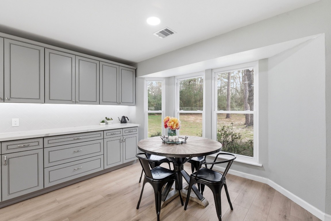 5222 Ranch Hill Drive Magnolia, TX 77354 - Photo 11 of 41 a kitchen with a table and chairs in it