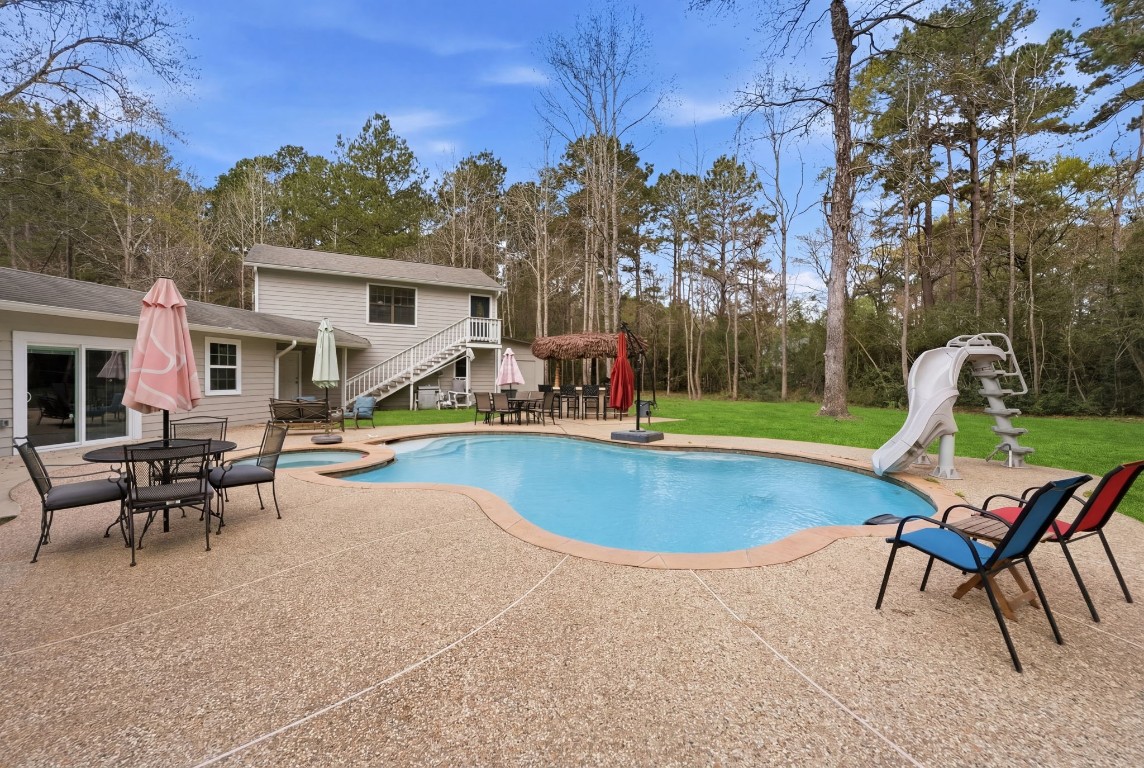 5222 Ranch Hill Drive Magnolia, TX 77354 - Photo 28 of 41 a view of a park with slide