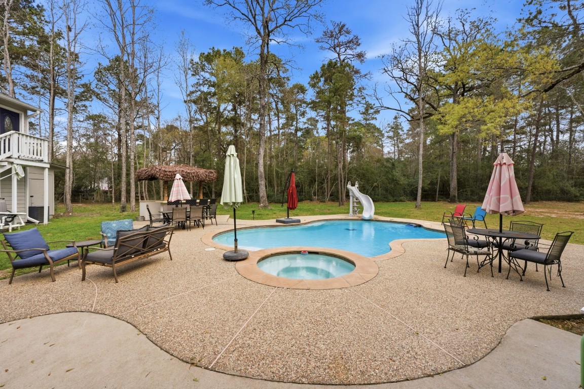 5222 Ranch Hill Drive Magnolia, TX 77354 - Photo 35 of 41 swimming pool with outdoor seating