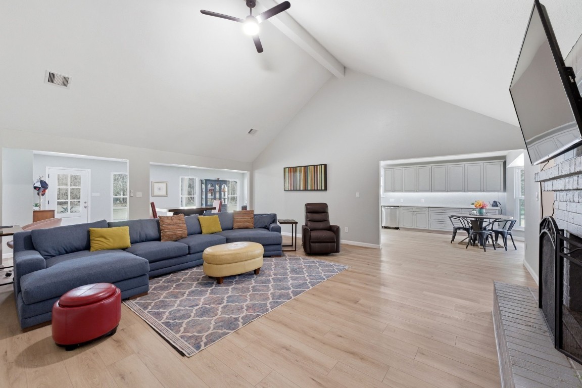 5222 Ranch Hill Drive Magnolia, TX 77354 - Photo 8 of 41 a living room with furniture and a wooden floor
