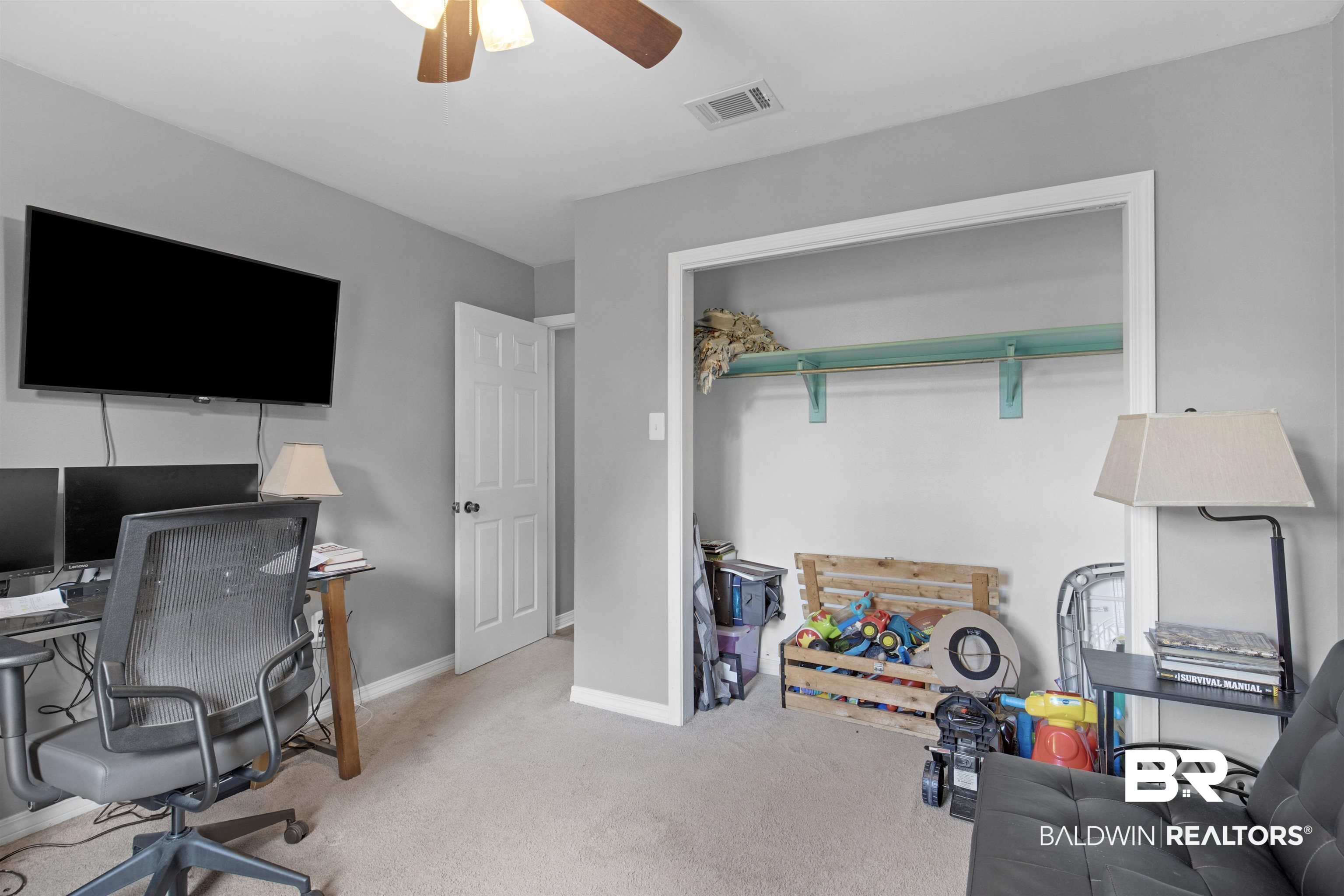 13925 Fort Lake Road Grand Bay, AL 36541 - Photo 19 of 37 Carpeted office featuring visible vents, baseboards, and ceiling fan
