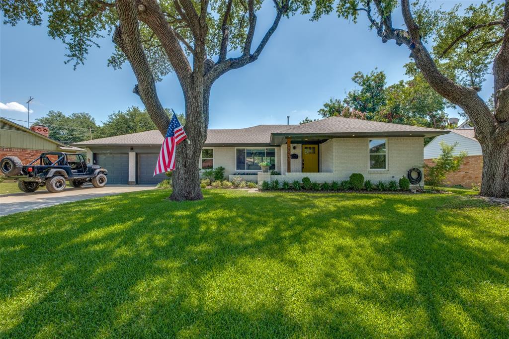 6556 Highgate Lane Dallas, TX 75214 - Photo 1 of 1 a front view of house with yard and green space