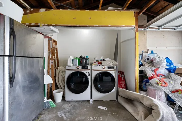 an outdoor space with patio furniture and potted plants