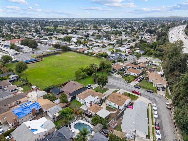 an aerial view of a house with a lake view