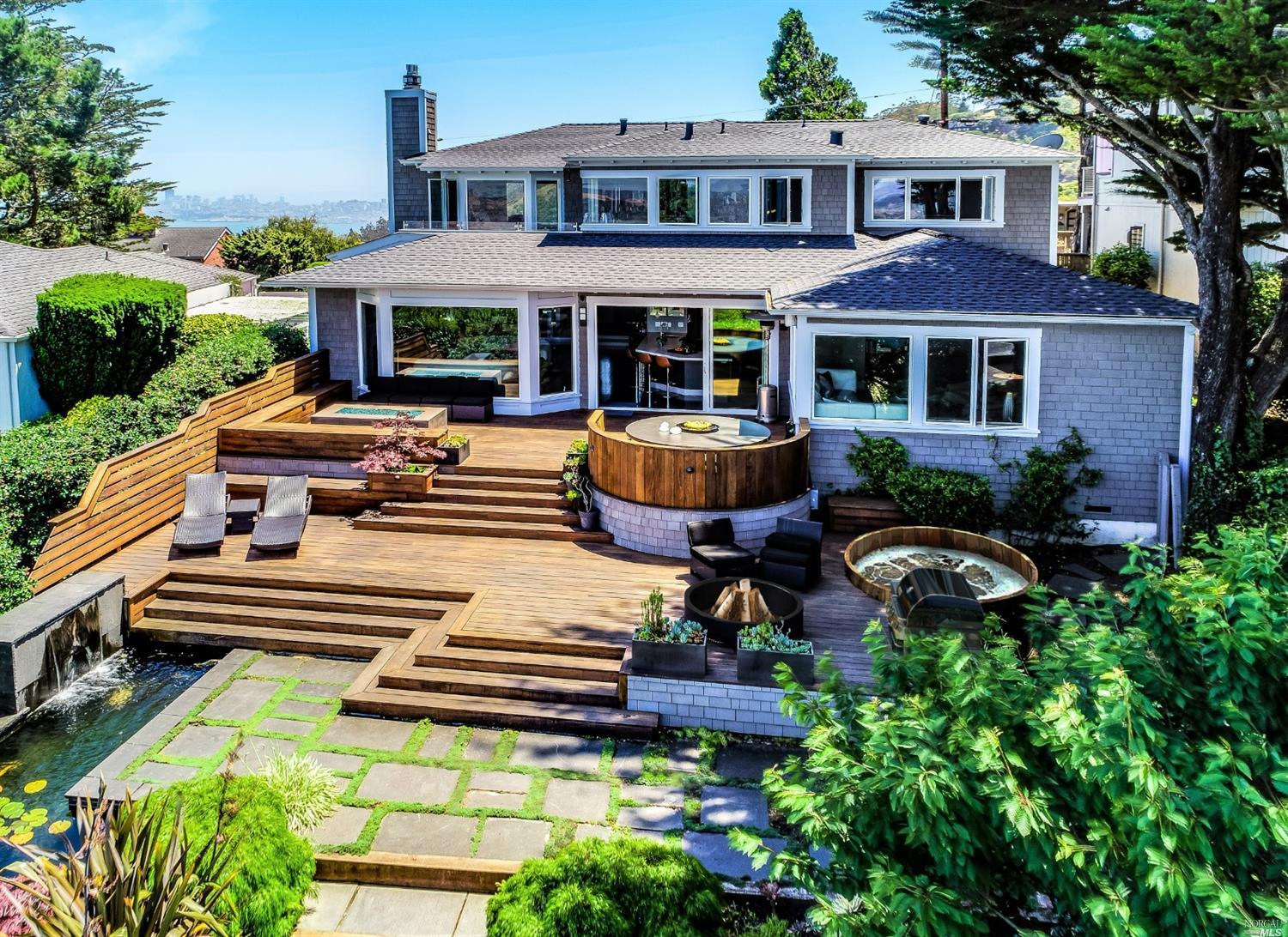 106 Cloud View Road Sausalito, CA 94965 - Photo 1 of 1 This two level home, with level entry to public rooms & bedrooms suite, faces northwest to amazing views including sunsets behind Mt. Tam, the Marinas and the Bay AND Southeast from the upper level (Primary Suite) to San Francisco and the Bay Bridge. Very rare indeed! Great indoor/outdoor flow!