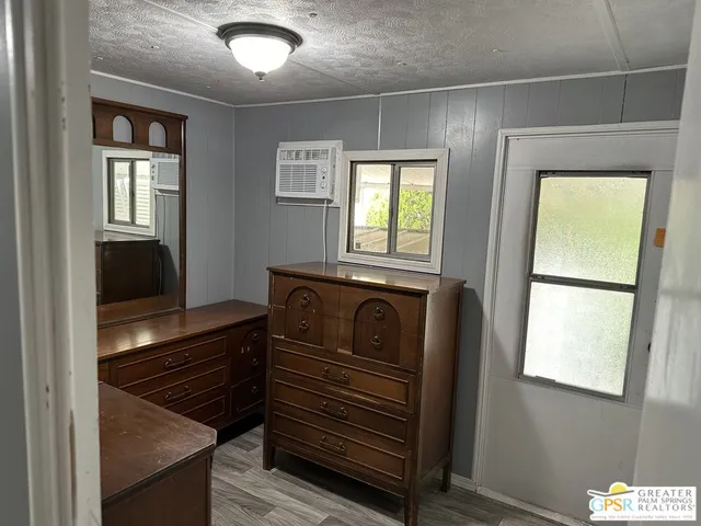 a view of an entryway with a washer and dryer