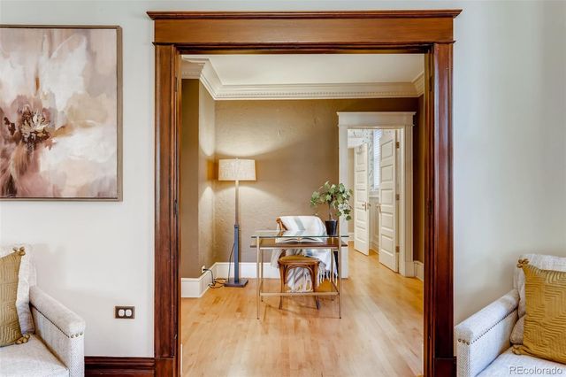 a view of a living room and dining room