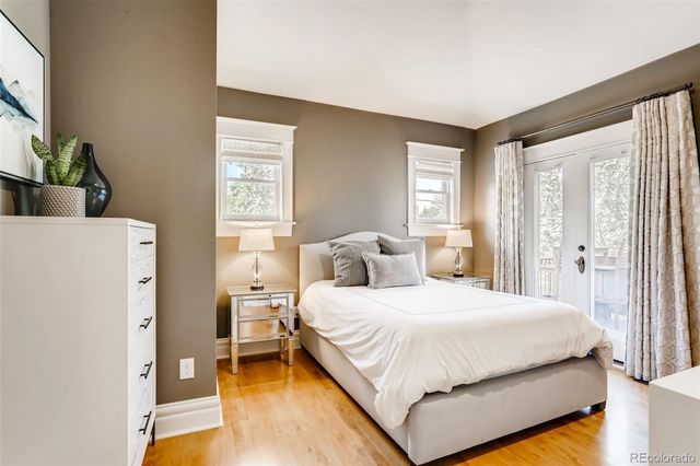 a bedroom with a bed and a cabinets