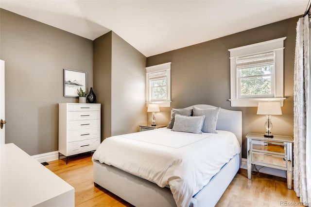 a very nice looking dining room with a table and chairs