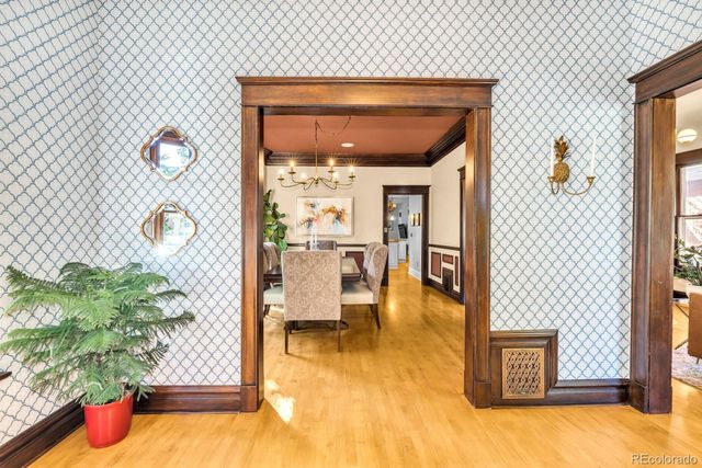 view of living room with furniture and flowers