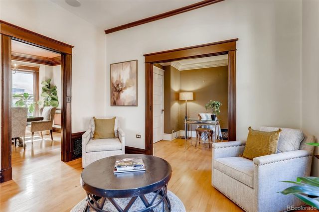 a living room with furniture and a table