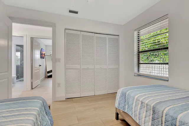 a outdoor living space with furniture and a wooden floor