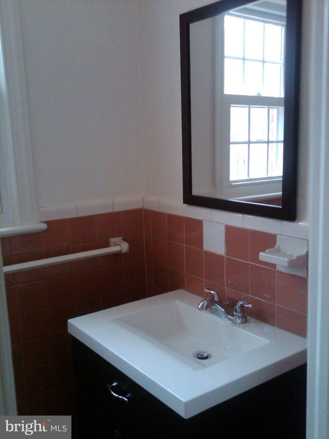 9513 Evergreen Street Silver Spring, MD 20901 - Photo 7 of 12 Main Floor Powder Room