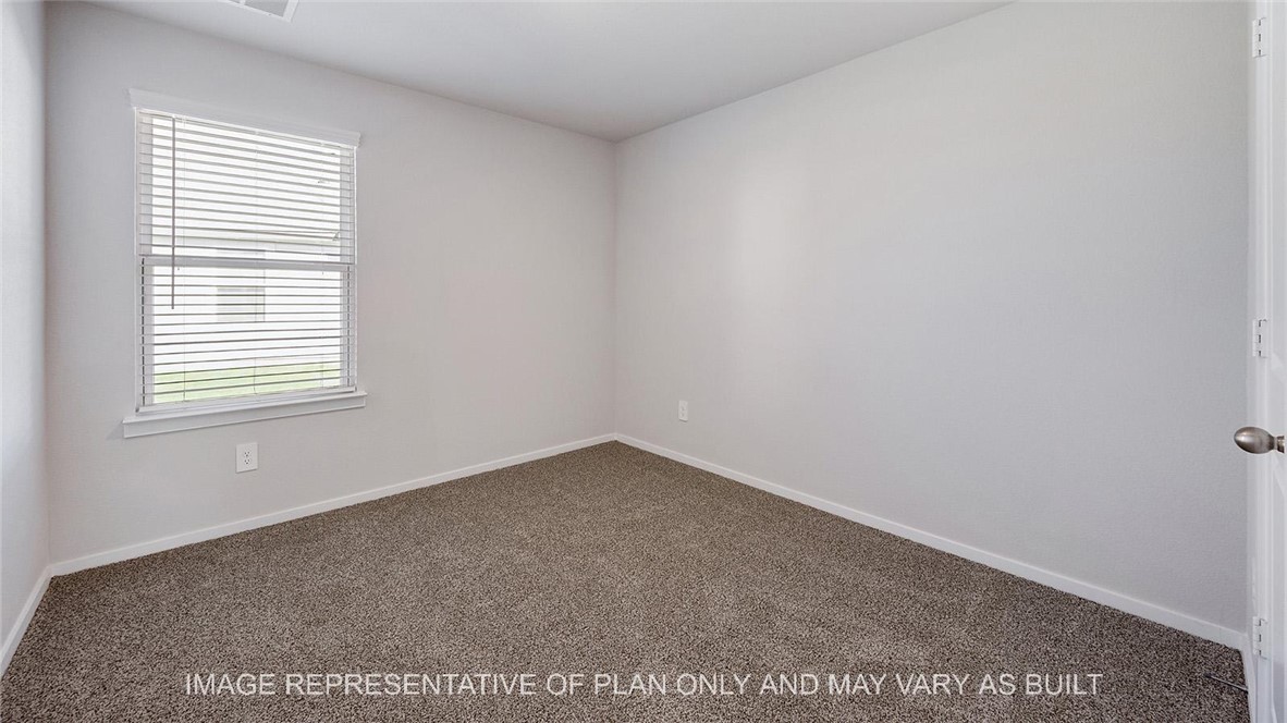 5539 Harriet Street Bryan, TX 77807 - Photo 13 of 17 an empty room with a window