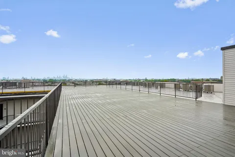 a view of a balcony with an ocean