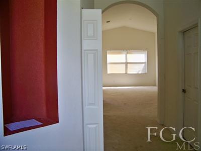 9329 Chestnut Tree Loop, Unit Q Fort Myers, FL 33967 - Photo 2 of 8 a view of door