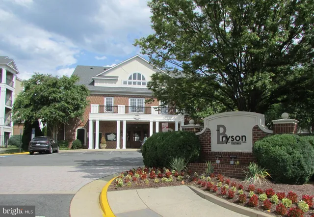 a front view of a building with garden