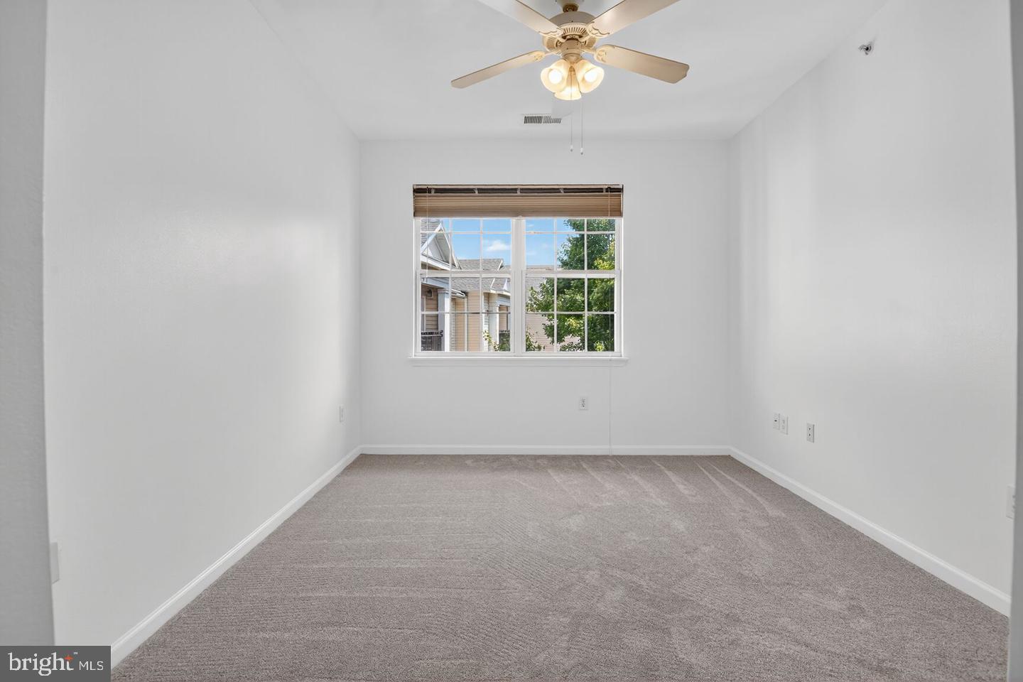 12945 Centre Park Circle, Unit 403 Herndon, VA 20171 - Photo 11 of 23 an empty room with a window