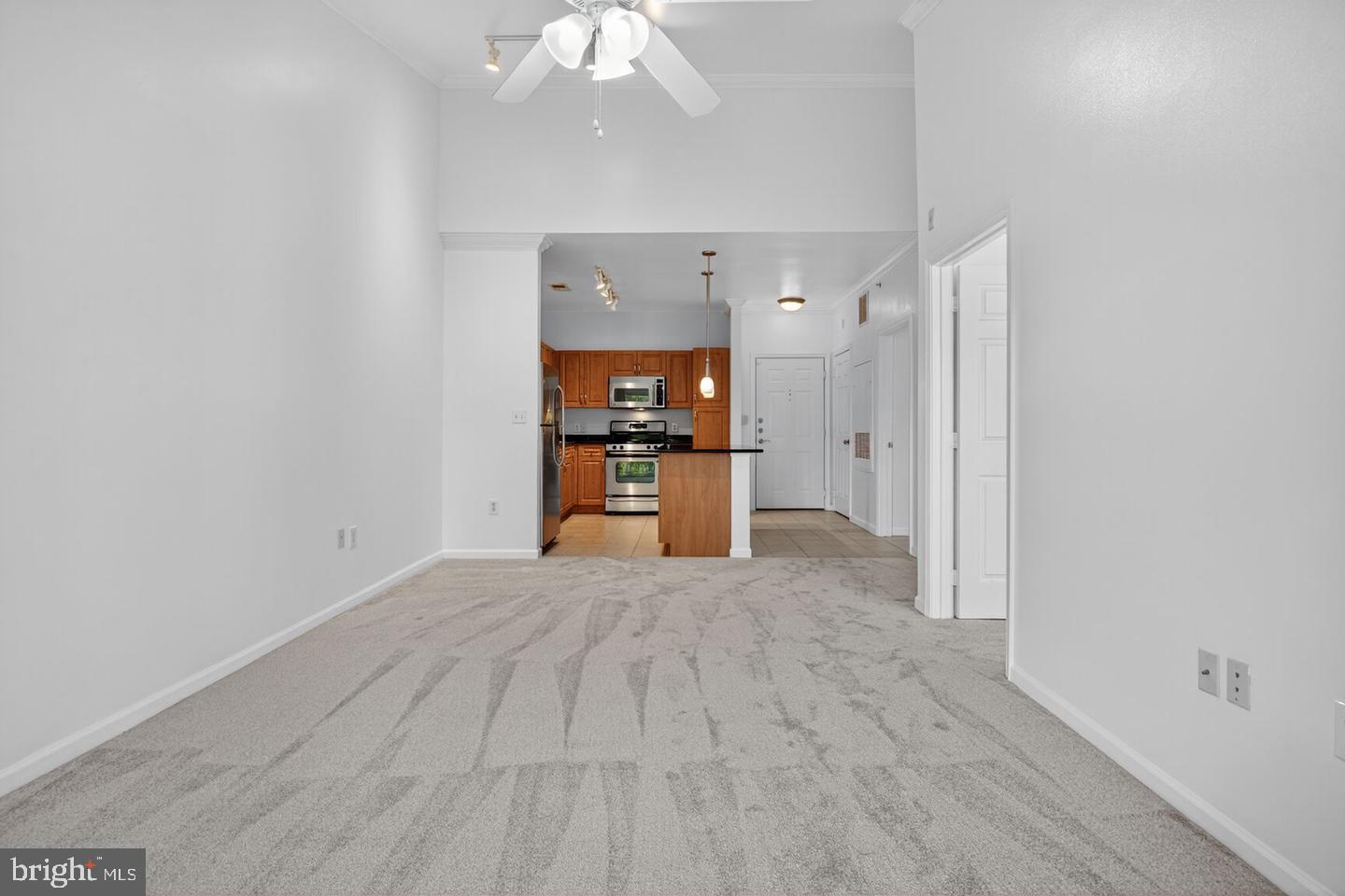 12945 Centre Park Circle, Unit 403 Herndon, VA 20171 - Photo 12 of 23 a view of a livingroom with a furniture