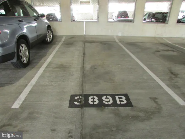 a room with gym equipment and windows