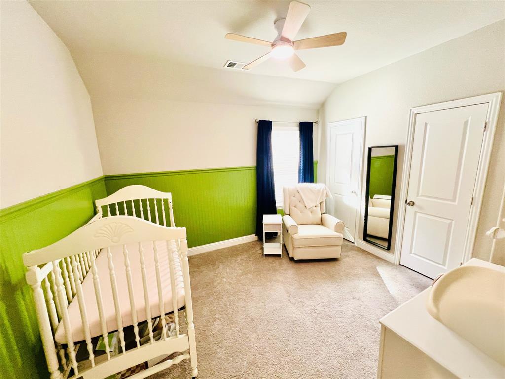 552 Sequoia Street Allen, TX 75002 - Photo 13 of 20 a bedroom with furniture and a large window