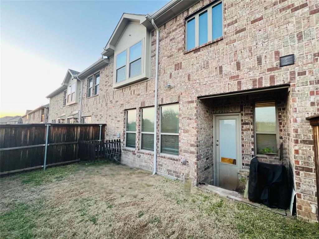 552 Sequoia Street Allen, TX 75002 - Photo 18 of 20 a view of a house with a sink and a yard