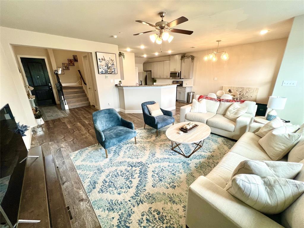 552 Sequoia Street Allen, TX 75002 - Photo 3 of 20 a living room with furniture and kitchen view