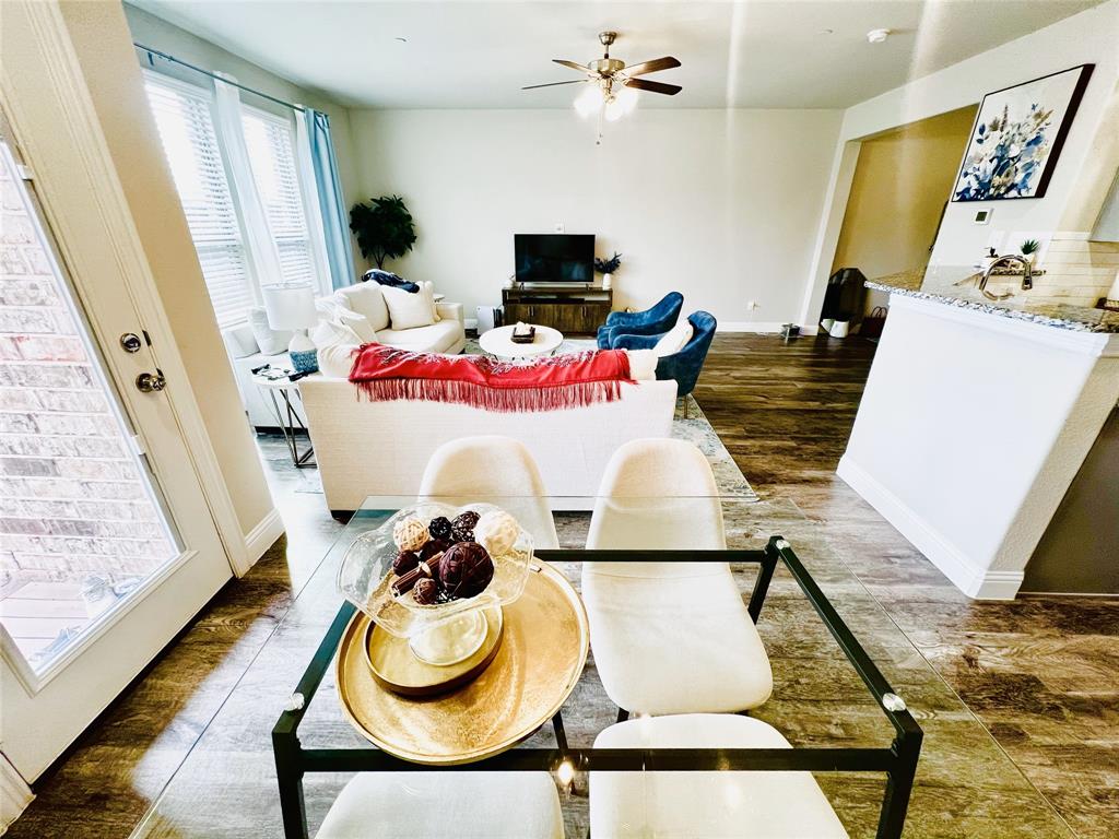 552 Sequoia Street Allen, TX 75002 - Photo 6 of 20 a room with table chair and wooden floor