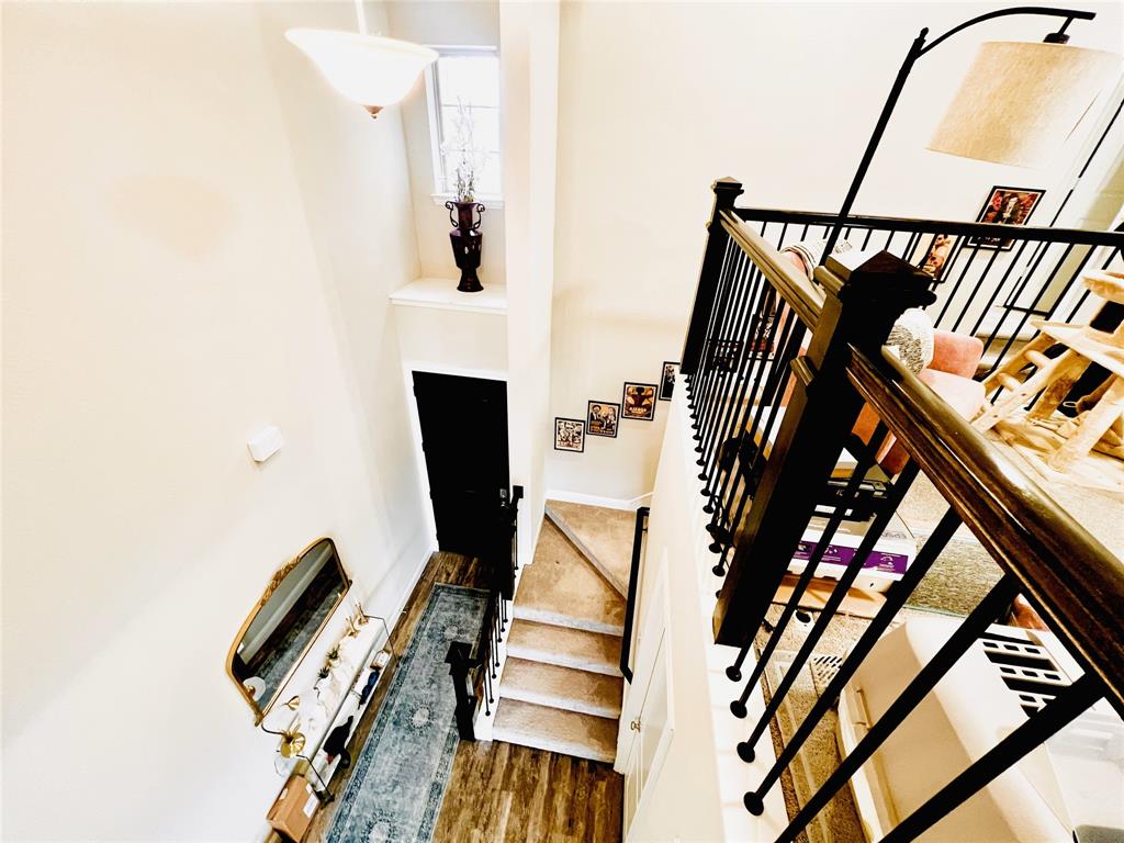 552 Sequoia Street Allen, TX 75002 - Photo 7 of 20 a view of stairs with furniture