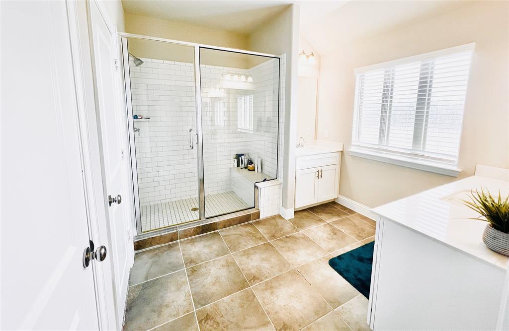 552 Sequoia Street Allen, TX 75002 - Photo 10 of 20 a view of a bathroom with a shower