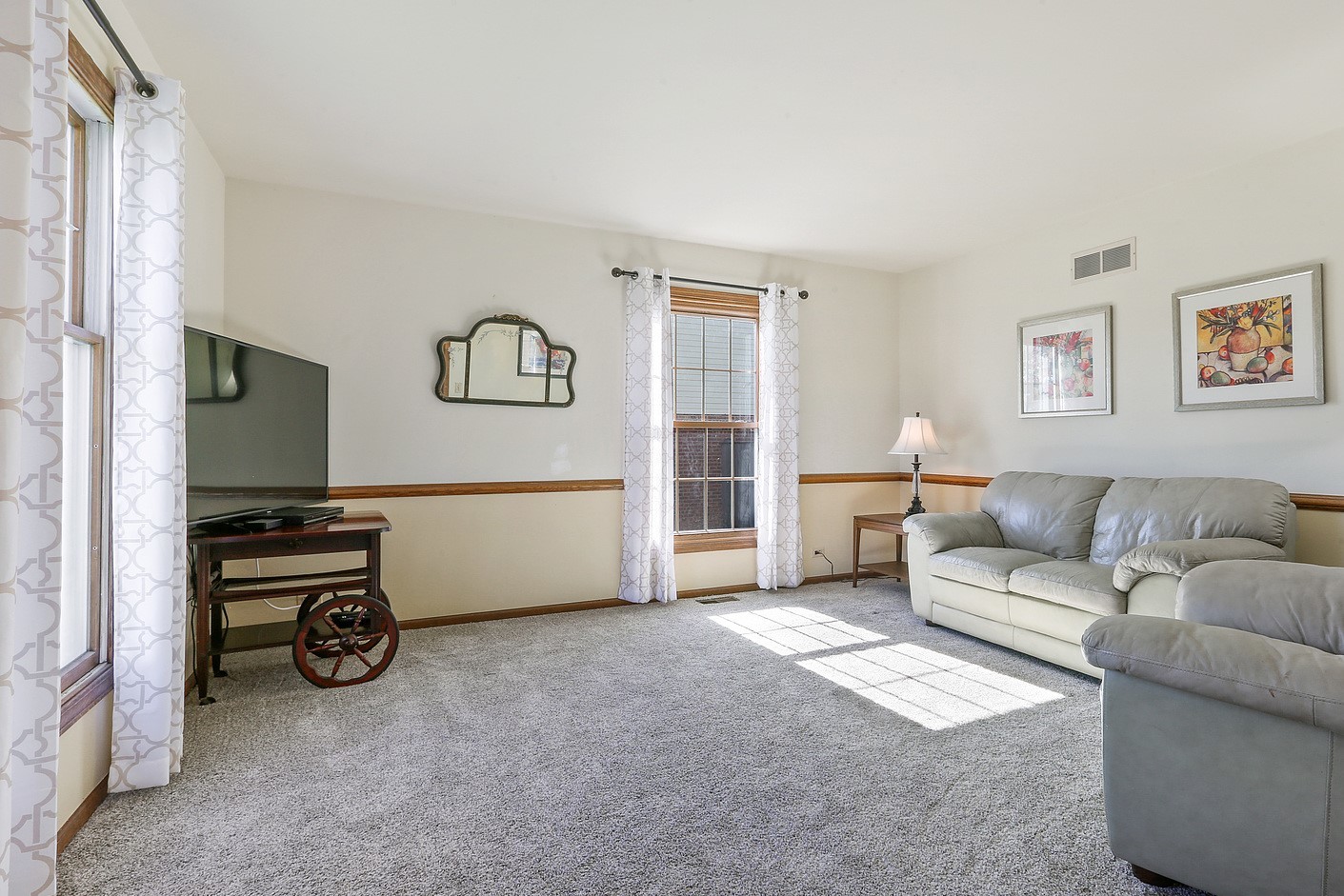 3582 Ronald Road Crete, IL 60417 - Photo 2 of 16 a living room with furniture and a flat screen tv