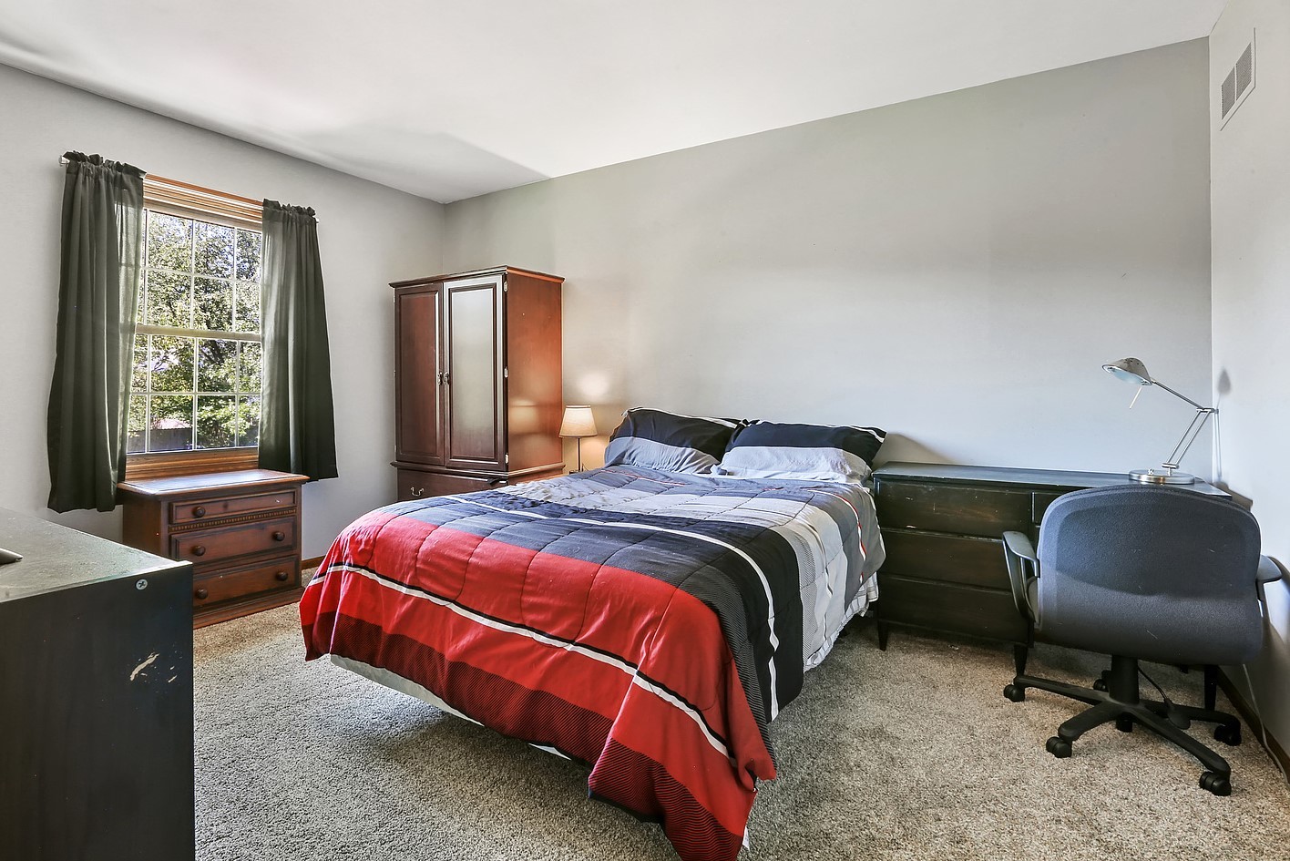 3582 Ronald Road Crete, IL 60417 - Photo 11 of 16 a bedroom with a bed chair and window