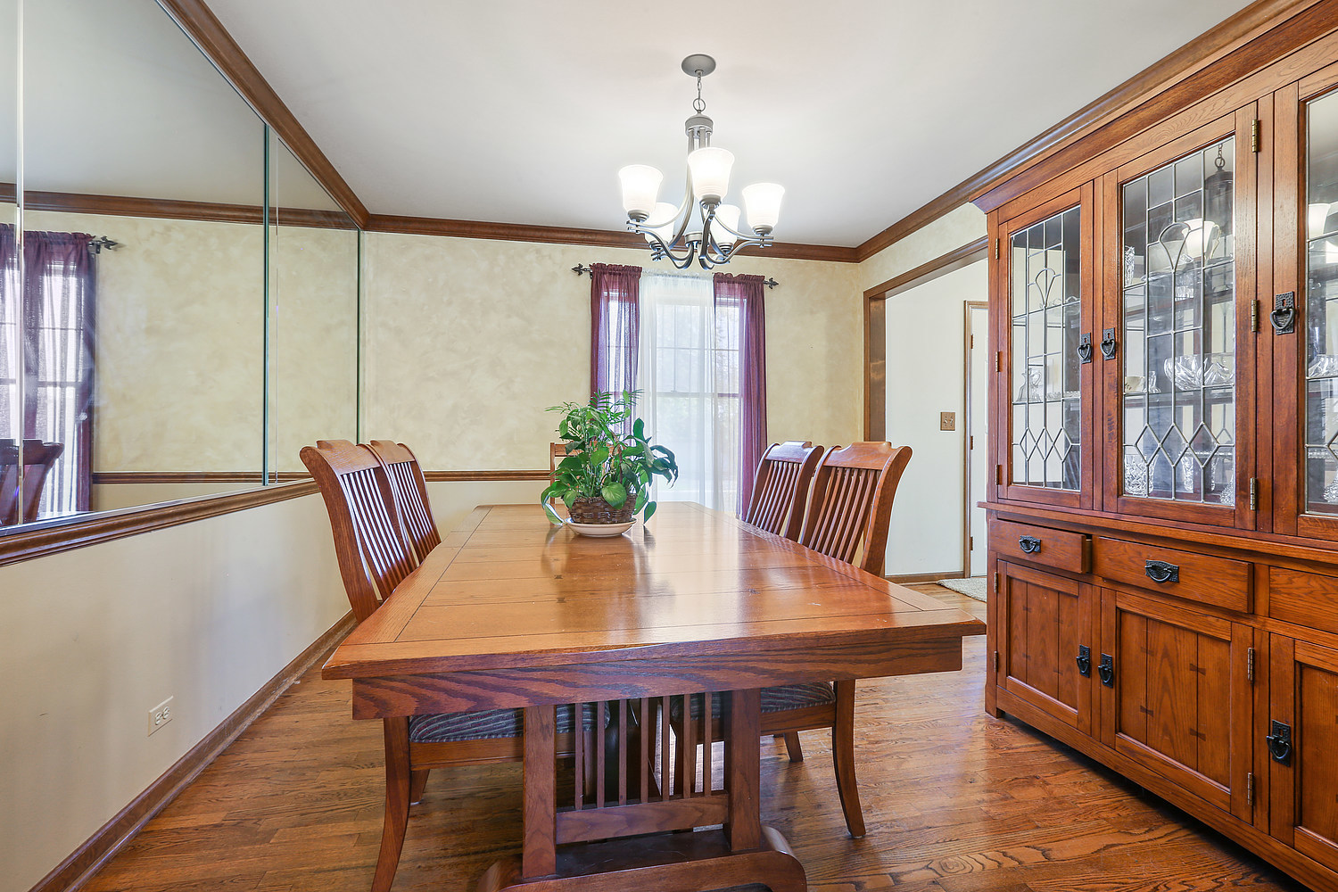 3582 Ronald Road Crete, IL 60417 - Photo 3 of 16 a view of a dining room with furniture window and wooden floor