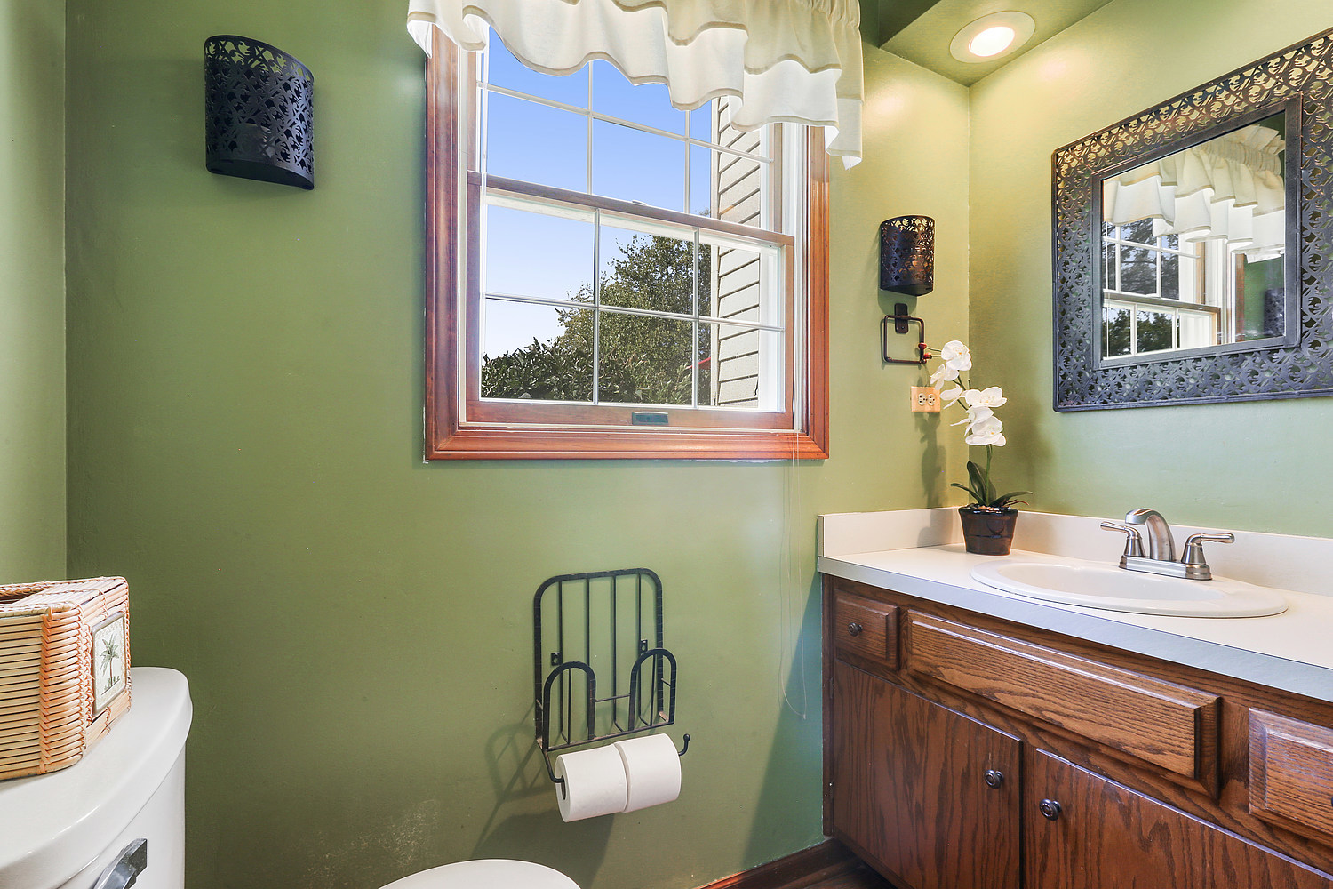 3582 Ronald Road Crete, IL 60417 - Photo 7 of 16 a bathroom with a sink and a mirror