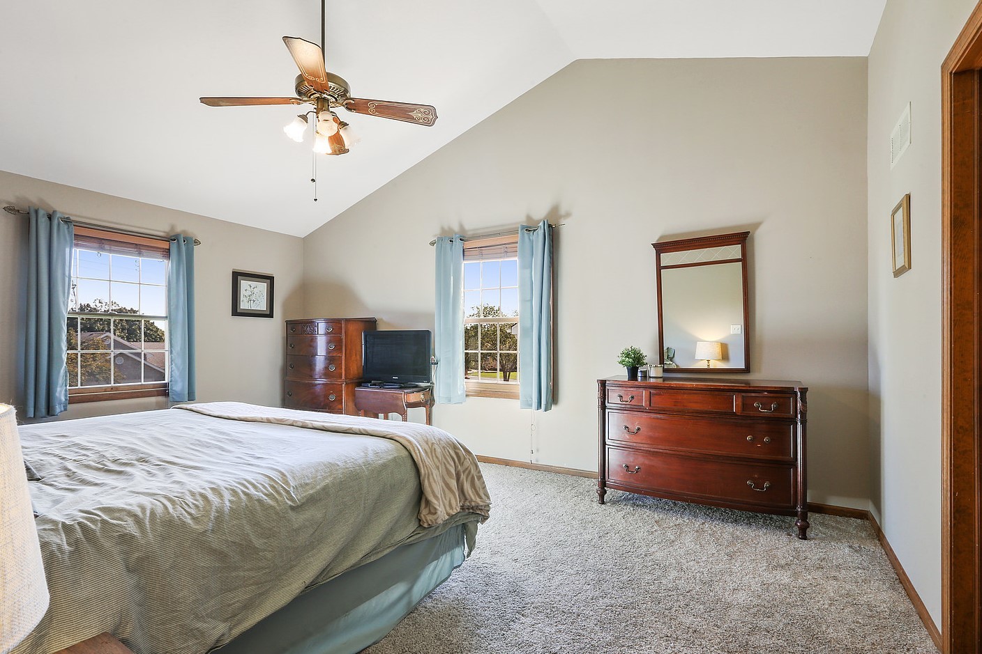 3582 Ronald Road Crete, IL 60417 - Photo 8 of 16 a bedroom with a bed and a table