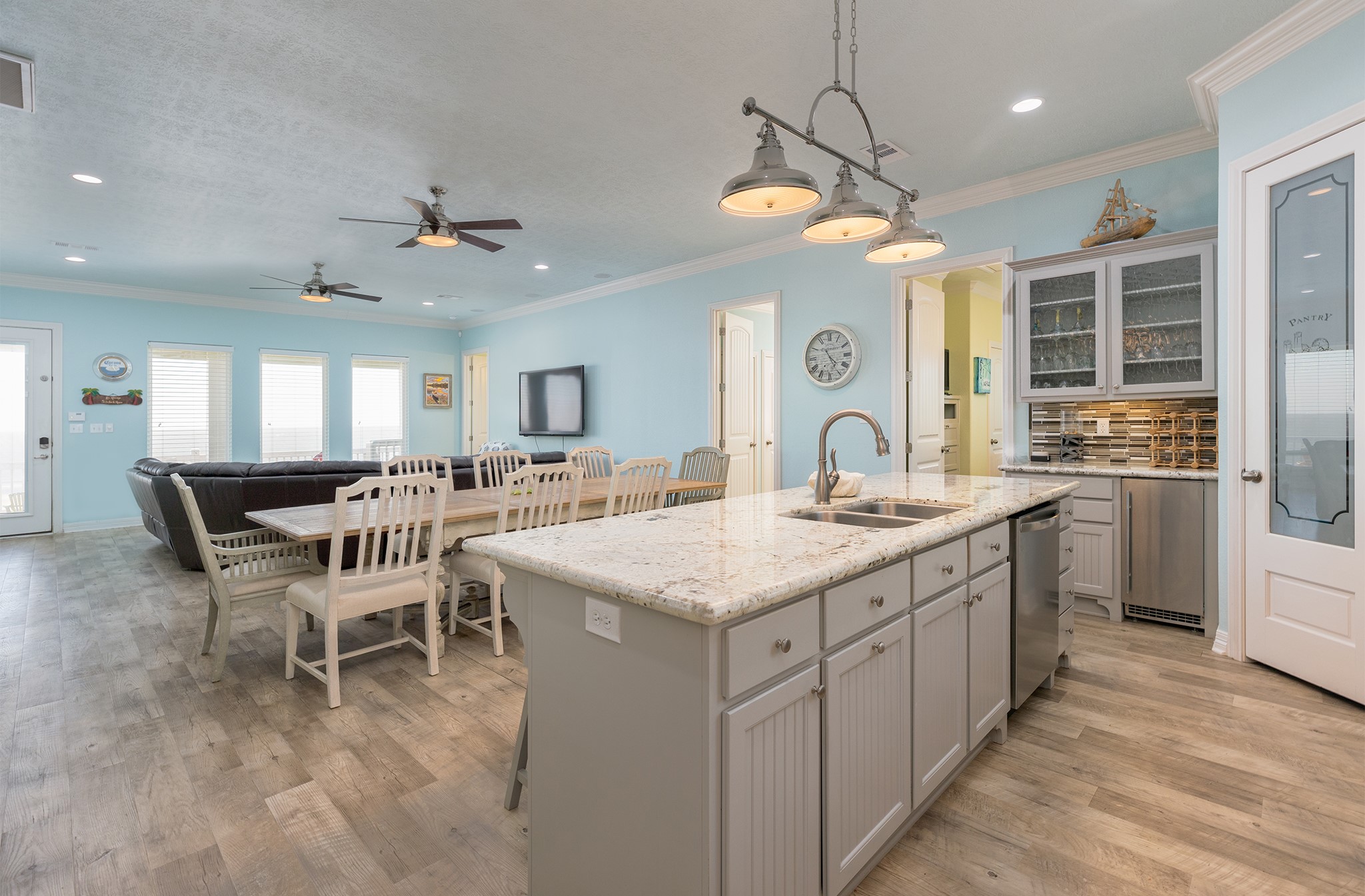843 South Jacks Road Crystal Beach, TX 77650 - Photo 30 of 45 This kitchen is STOCKED with all of your cooking essentials. A large dry bar with glass cabinetry.