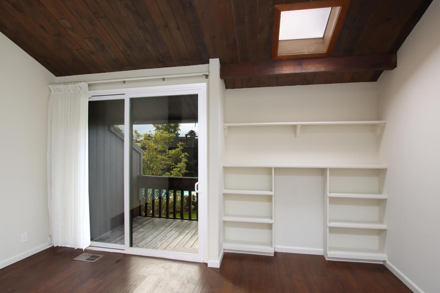 103 Shelter Lagoon Drive Santa Cruz, CA 95060 - Photo 16 of 39 a view of walk in closet with empty racks