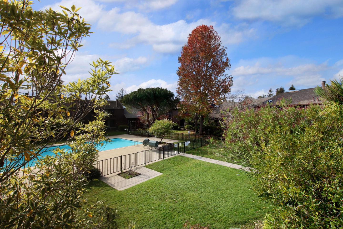 103 Shelter Lagoon Drive Santa Cruz, CA 95060 - Photo 21 of 39 a white house with a yard and sitting area