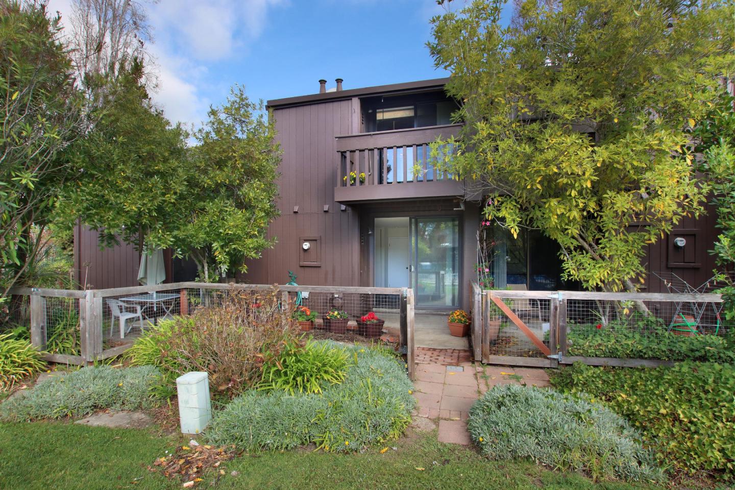103 Shelter Lagoon Drive Santa Cruz, CA 95060 - Photo 24 of 39 a front view of a house with a yard