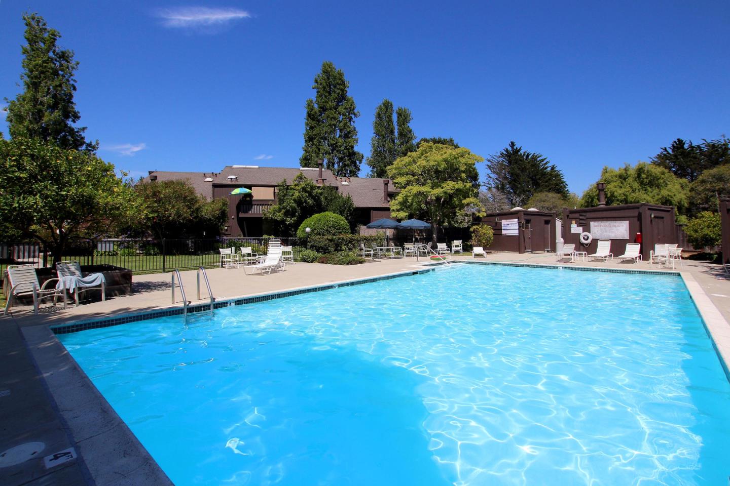 103 Shelter Lagoon Drive Santa Cruz, CA 95060 - Photo 33 of 39 a view of a swimming pool with chairs