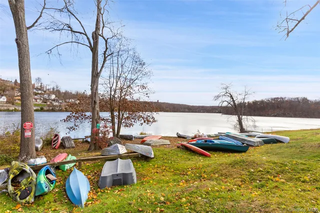 a view of a lake with a nearby beach