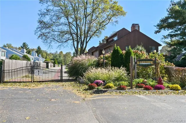 a house with a tree in front of it
