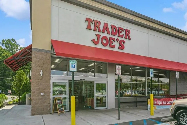 a view of a food mall next to a building
