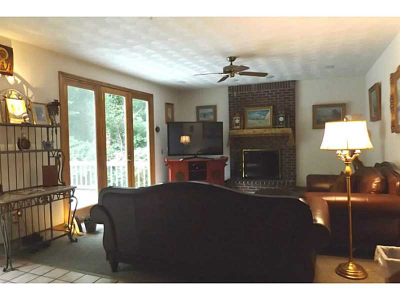 1140 High Hawk Road East Greenwich, RI 02818 - Photo 8 of 18 Den/Family/Great Room. Family room with Atrium door to deck