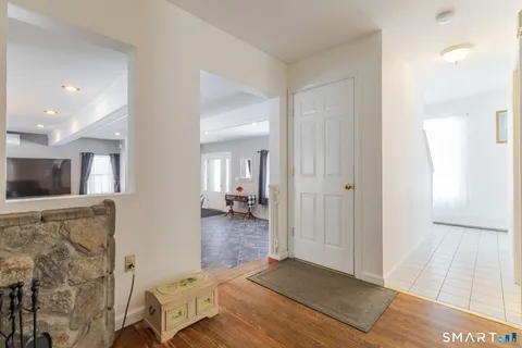 a view of a livingroom with furniture and wooden floor