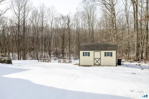 a house with trees in front of it